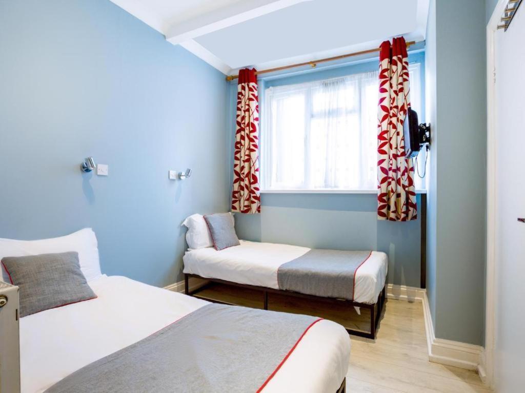 Orlando Hotel Londres Quarto foto
